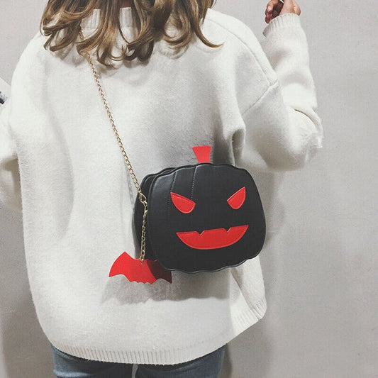 black_and_red_spooky_pumpkin_bag_crossover_women_using_purse